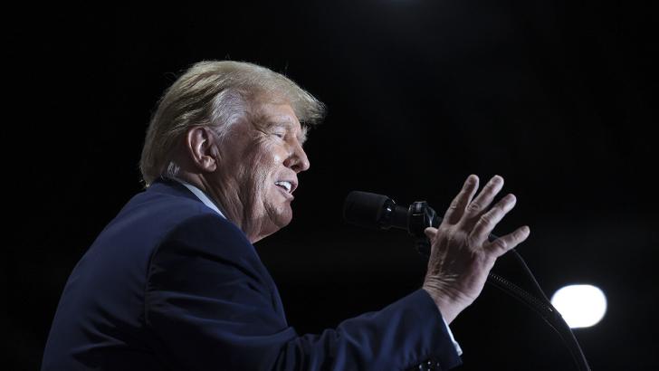 Donald Trump making a speech photographed from below 